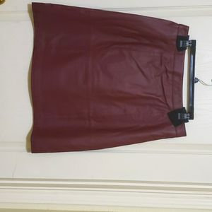 100% leather skirt. New - it's never been worn